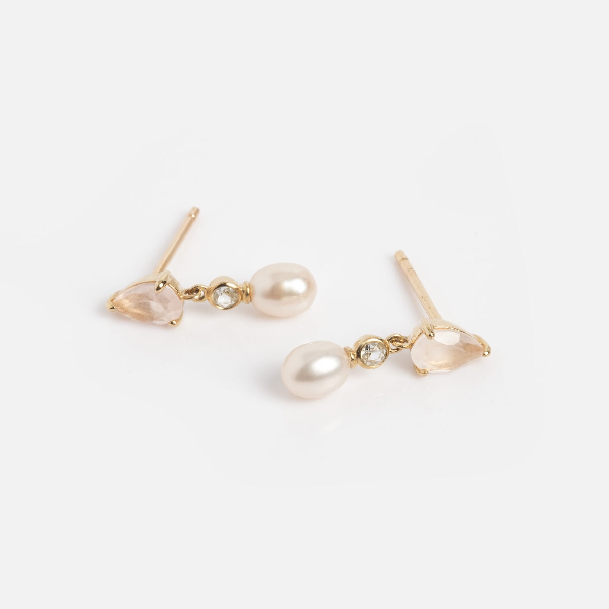 A pair of Solid Gold Aquamarine Rose Quartz and Pearl Drop Earrings, each with teardrop Lab Aquamarine, a clear stone, and an oval White Pearl, shown on a plain white background.
