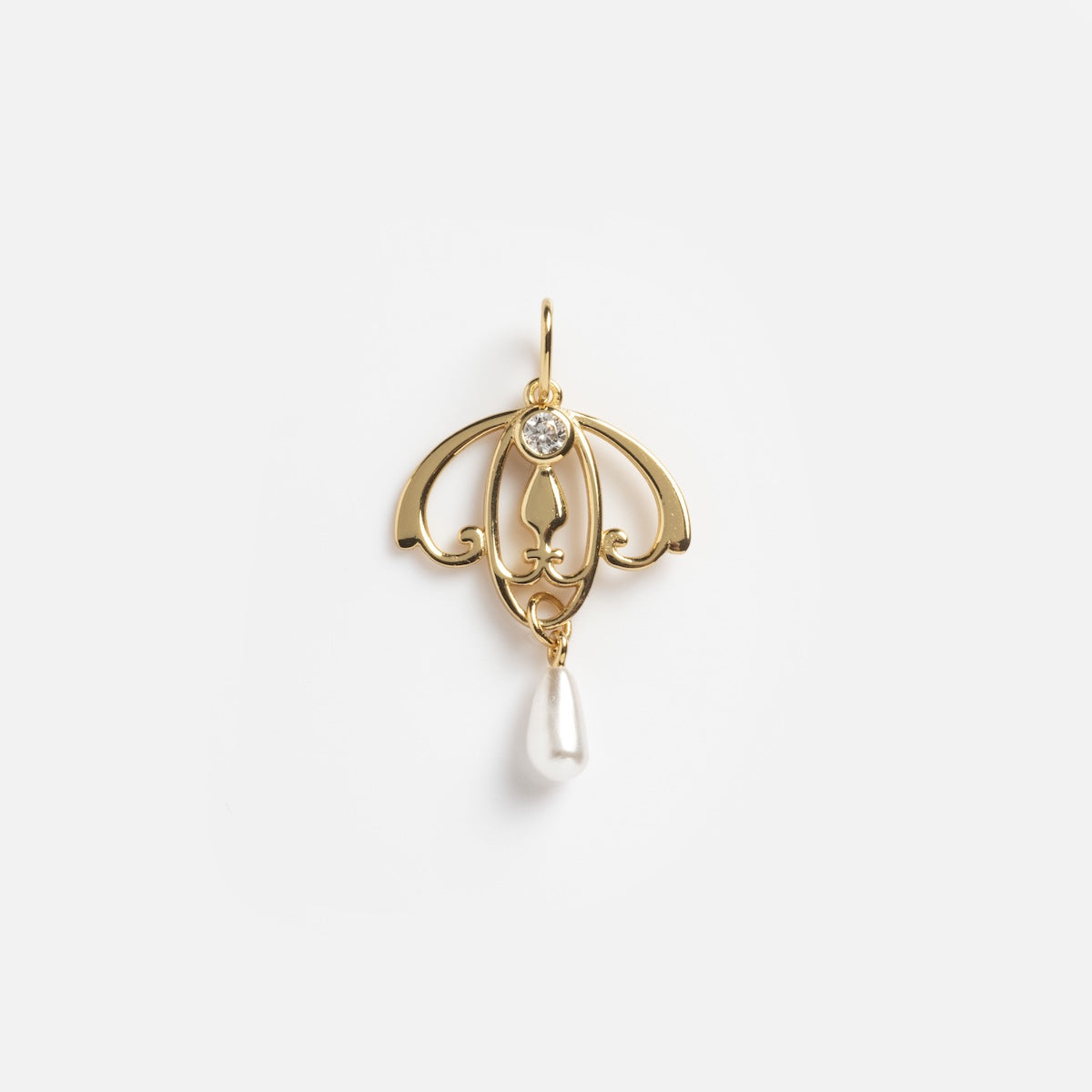 The Art Deco Open Work Pearl Drop Charm Sample is a gold pendant with an ornate, symmetrical design, featuring a round clear gemstone at the top and a teardrop-shaped white pearl drop at the bottom.