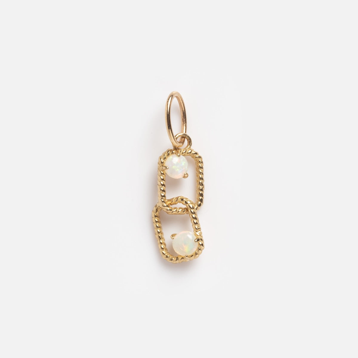 Solid Gold Floating Opal Duo Charm Sample: features two textured rectangular gold links, each set with a small round opal, displayed on a plain white background.