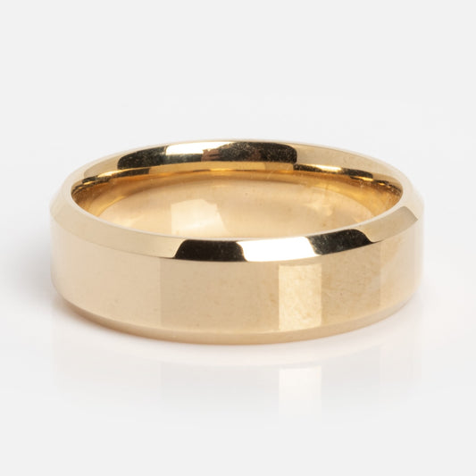 The Solid Gold Classic Band Sample Size 7 is a shiny 14k gold ring with a flat, faceted surface and smooth edges, shown on a white background.
