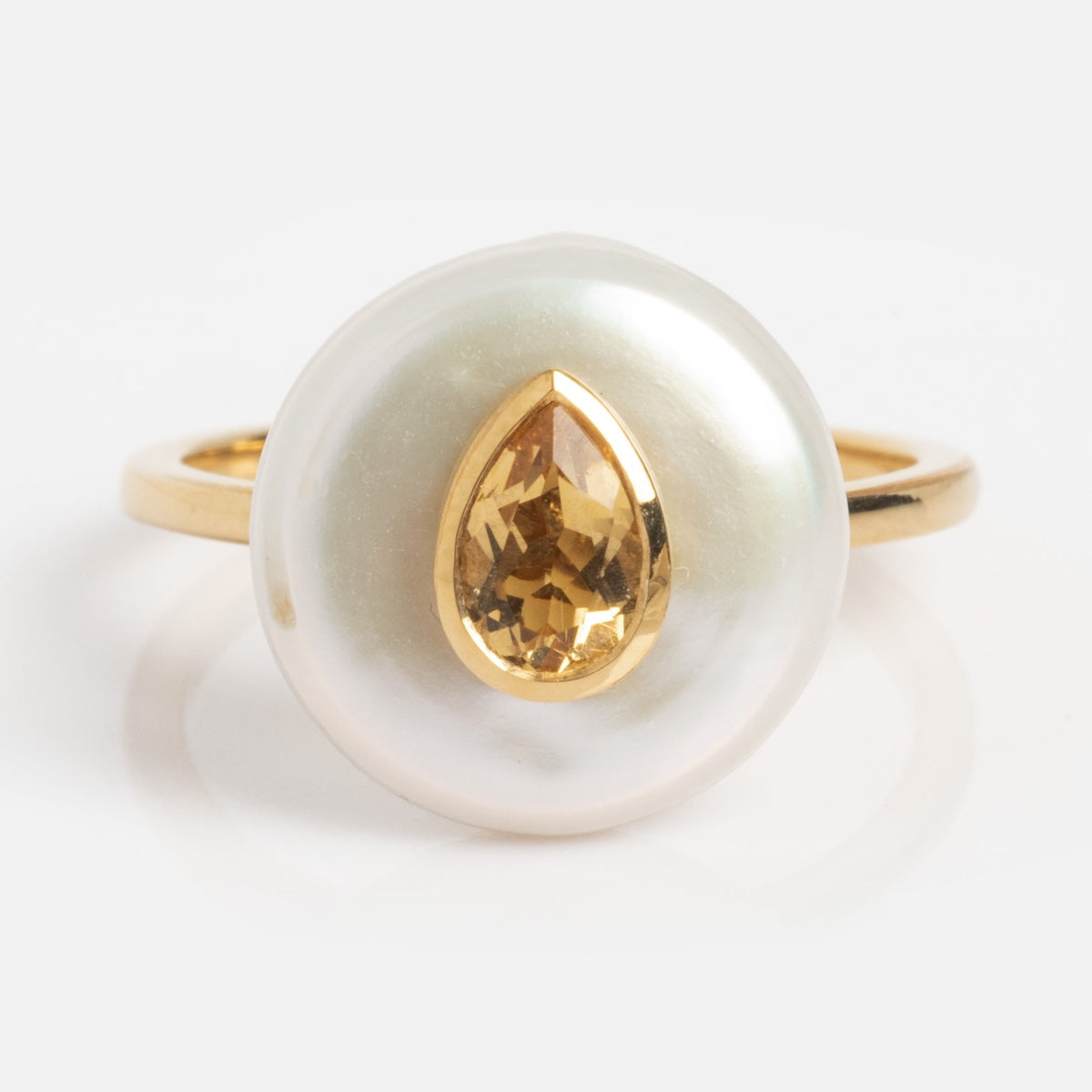 The Pearl and Citrine Ring Sample Size 7 features a large round freshwater pearl with a teardrop-shaped citrine gemstone set in gold at its center, all plated in 14k yellow gold and displayed on a white background.
