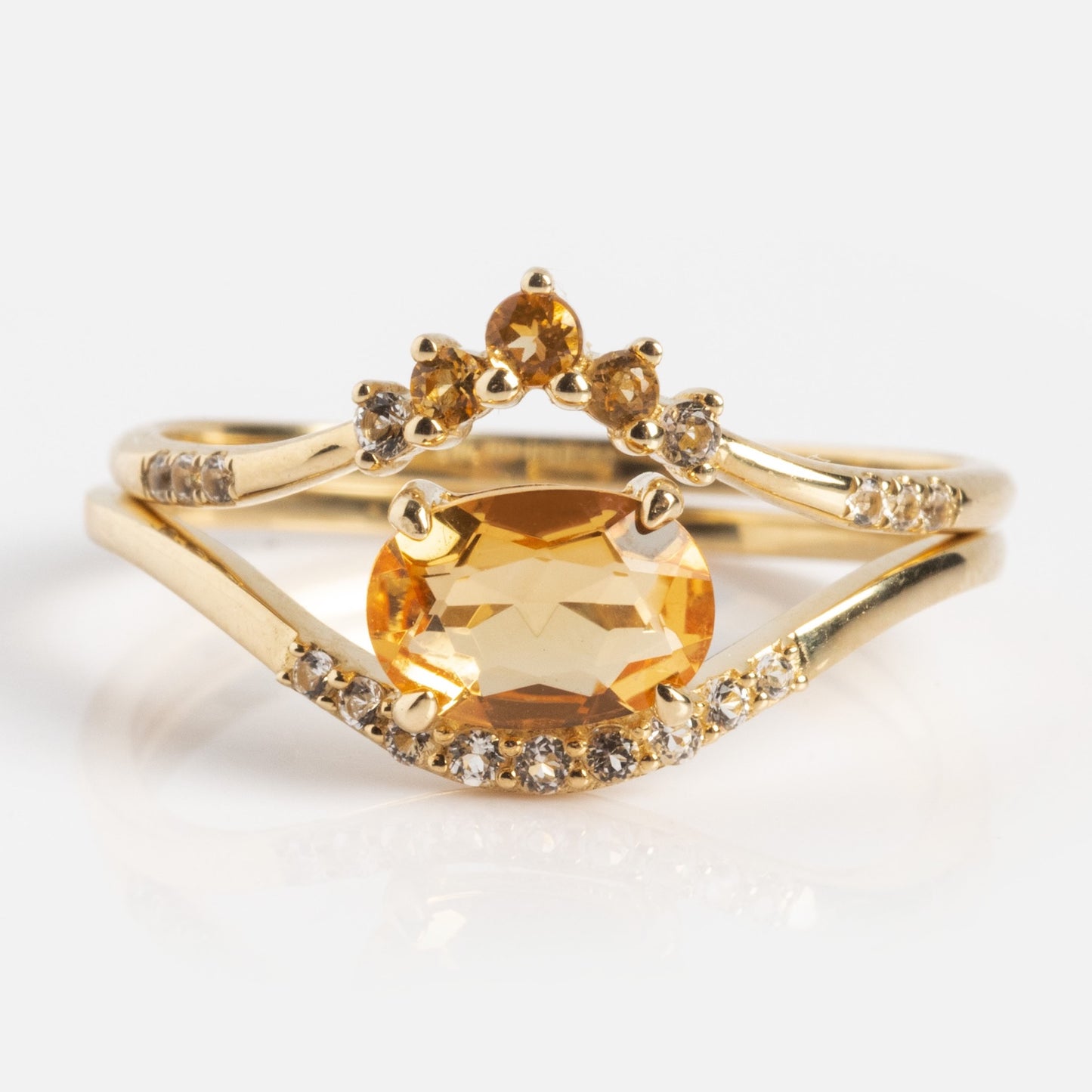 The Solid Gold 2025 November Capsule Citrine Full Set features a large oval yellow citrine centerpiece, small clear stones along the band, and a crown-like design with three small yellow gems above the main stone. Includes a free gift.