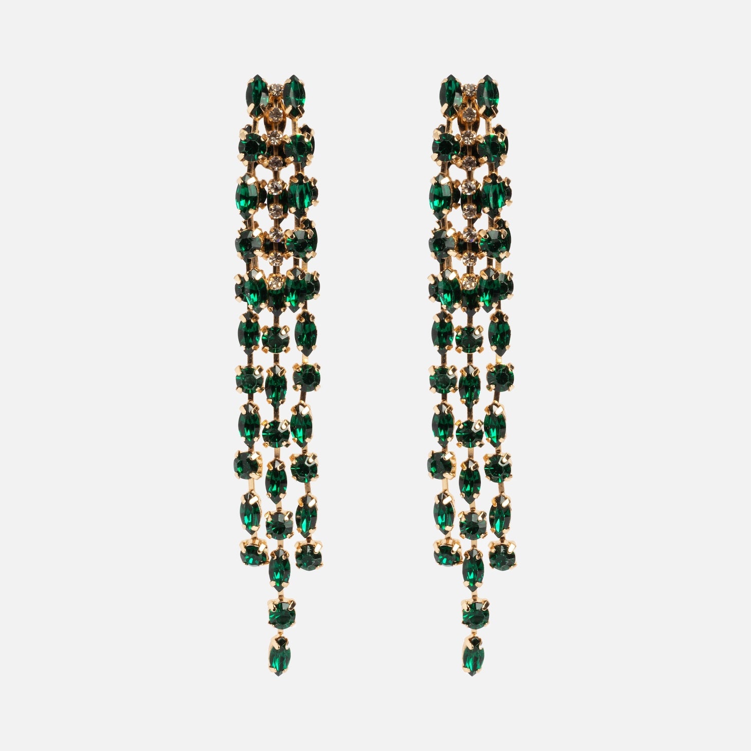 The Lola Earring is a pair of long chandelier earrings with gold settings and multiple rows of oval green gemstones.