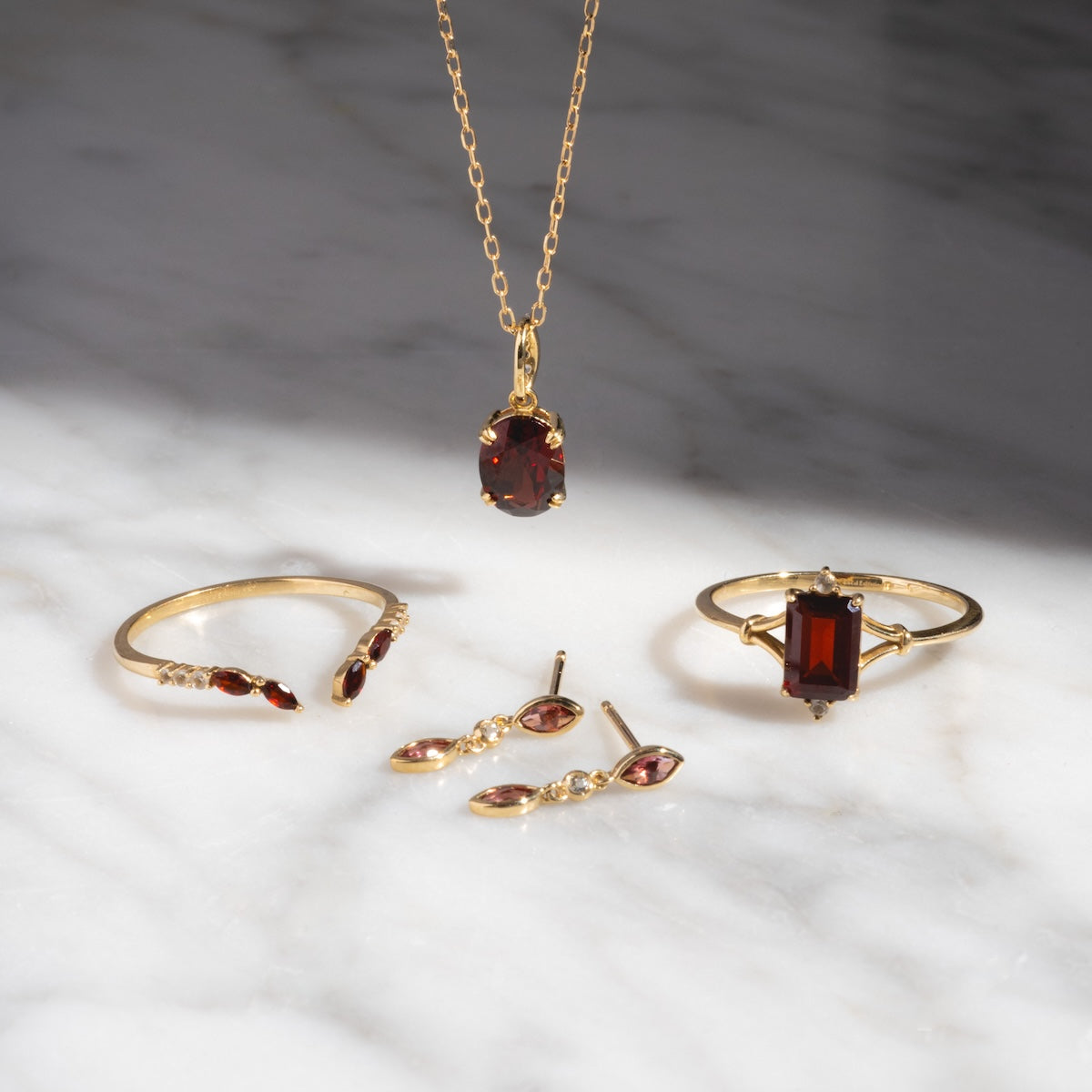 Solid Gold 2025 January Capsule Garnet Stacking Set with Free Gift