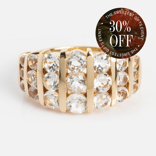The 14k Regal White Topaz Statement Ring, featuring multiple round clear gemstones, is showcased on a white background. A circular sticker at the top right announces The Sweetest Gifts Event, 30% Off.