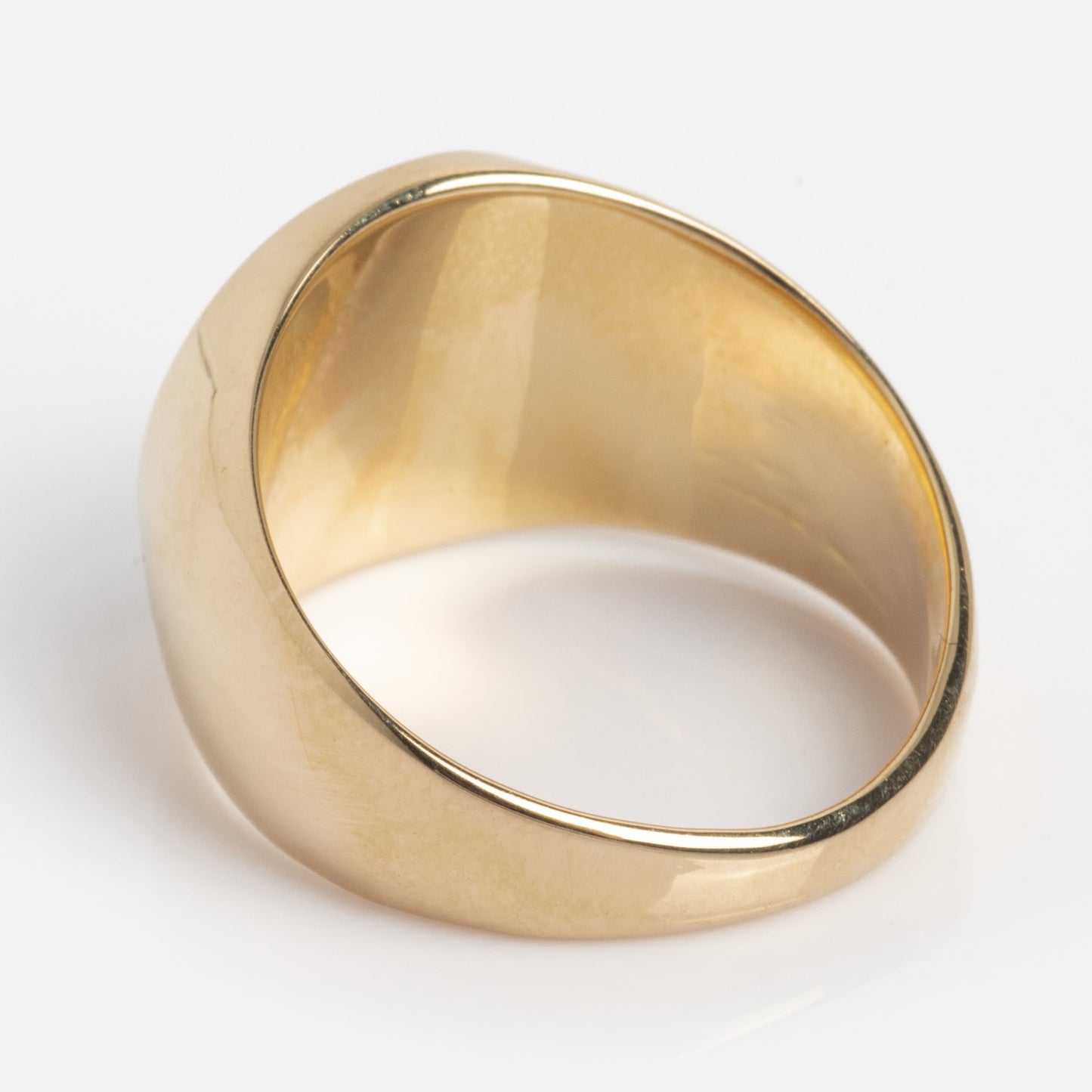 The I Like It Here Club x Local Eclectic Que Sera Sera Pinky Ring features a plain, polished gold band with a smooth, slightly curved design, shown against a white background.
