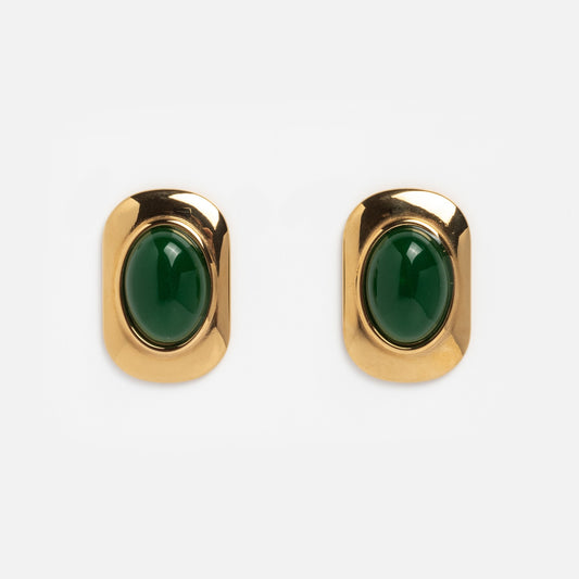 Ashley Earrings: A pair of gold rectangular earrings with rounded corners, each showcasing a glossy dark green oval stone at the center, displayed on a plain white background.
