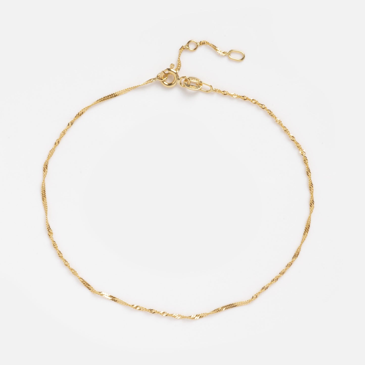 The Solid Gold Twisted Chain Anklet features a delicate 9k gold twisted chain with a small adjustable clasp, shown on a clean white background.