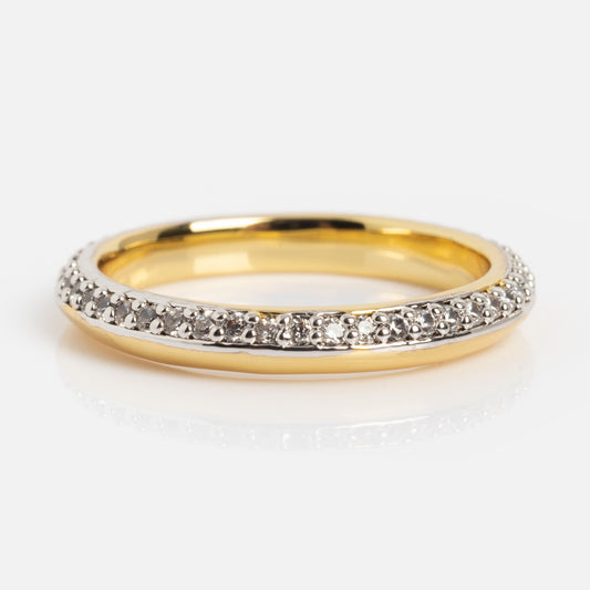 The Hidden Curse Word STFU Ring features a sleek gold band with small, sparkling diamonds set along the top half, showcased on a simple white background.