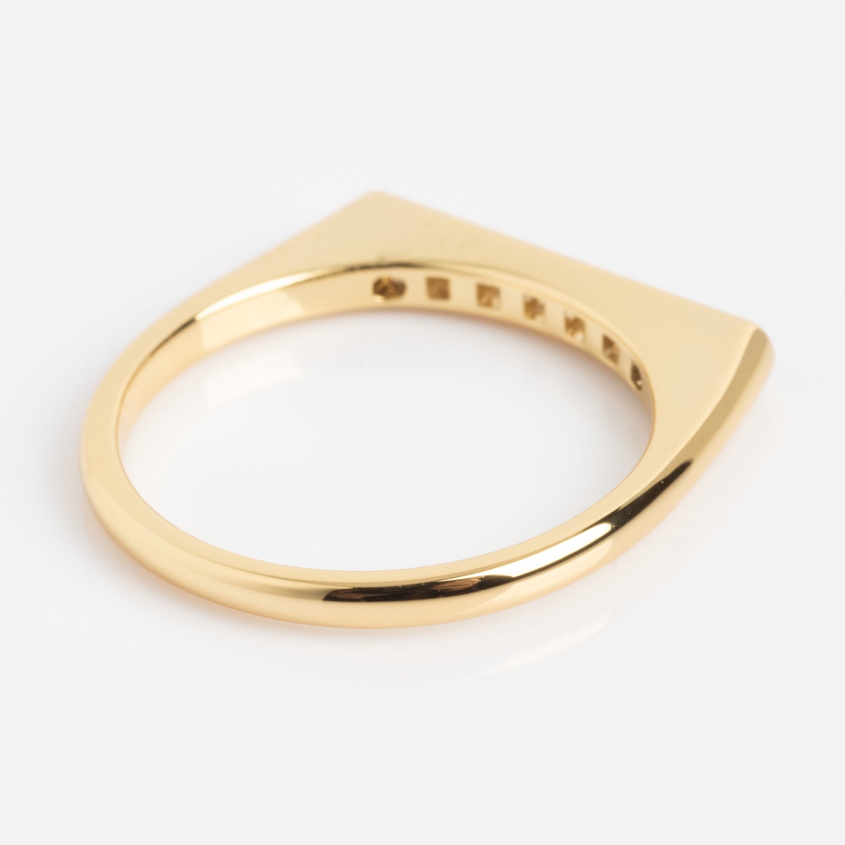 The Pave Bar Pinky Ring features a flat, squared top and a smooth, polished gold finish, displayed on a white background.