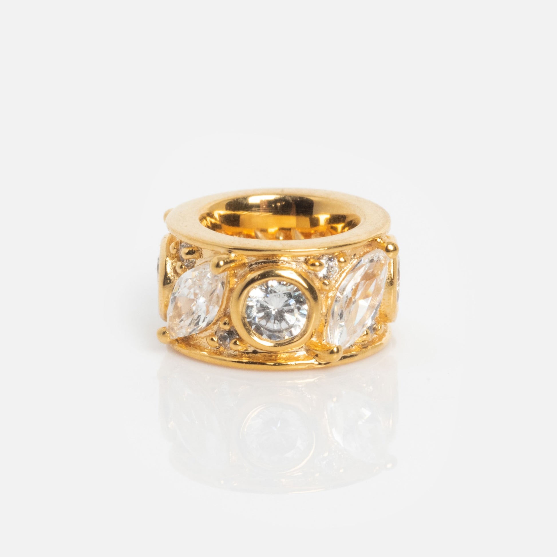 Shades of You Birthstone Spacer Charm displayed on a white background, featuring an intricate design with round and marquise-cut clear gemstones set around the band.