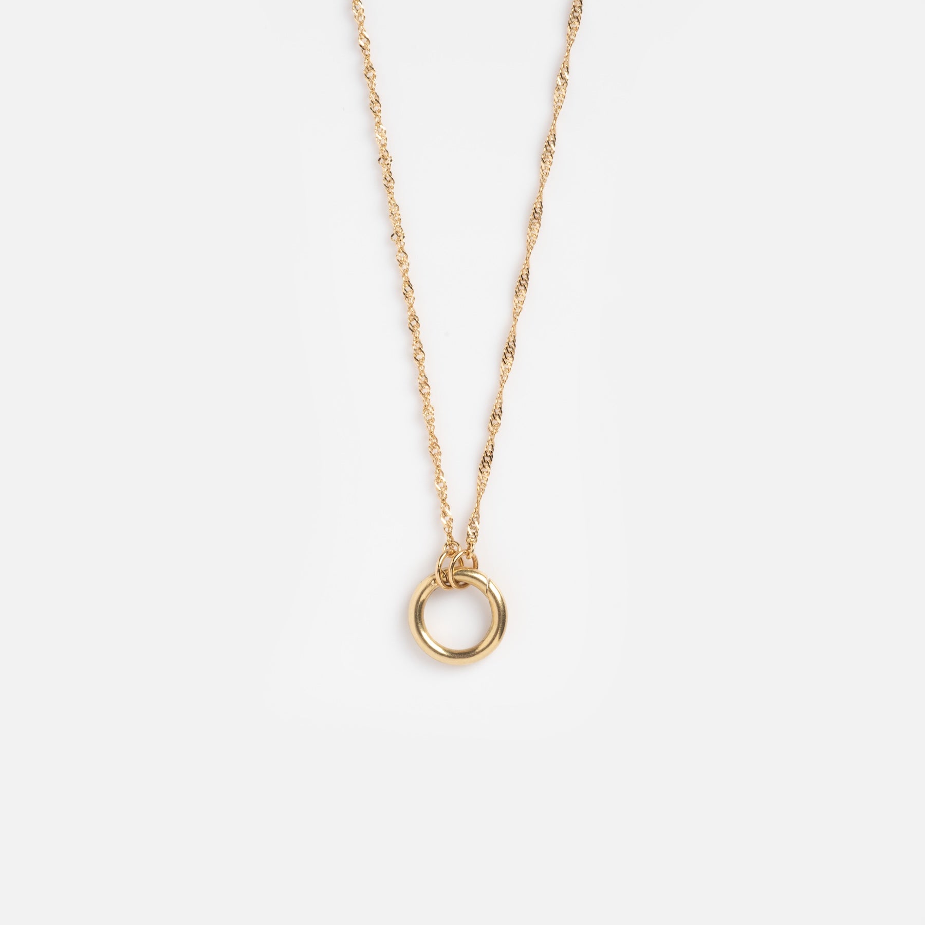The Solid Gold Perfect Start Charm Holder Necklace features a 9k solid gold twisted chain and a simple circular pendant, shown on a plain white background.