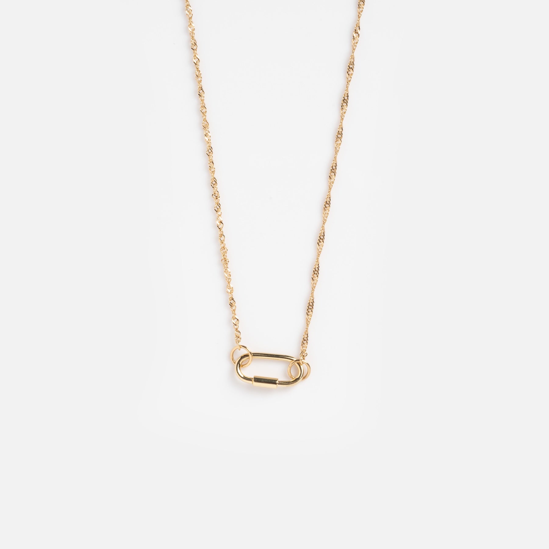 The Solid Gold Perfect Start Charm Holder Necklace showcases a delicate 9k solid gold chain with a small oval carabiner-style clasp pendant, ideal for effortless charm stacking. Photographed on a plain white background.