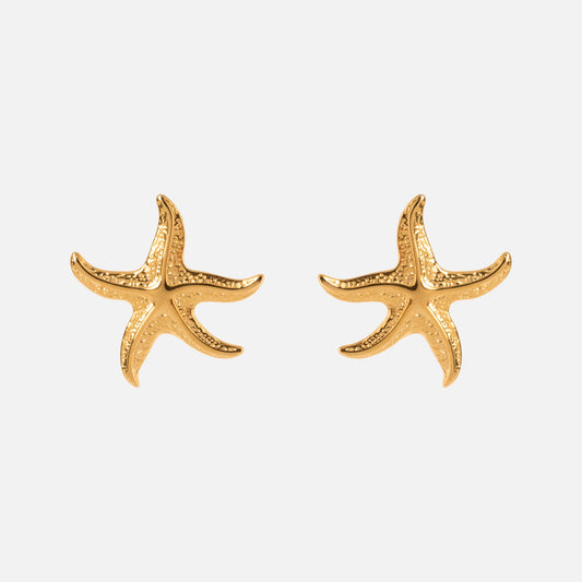 Starfish Earrings: Gold, starfish-shaped with textured details, shown on a plain white background.