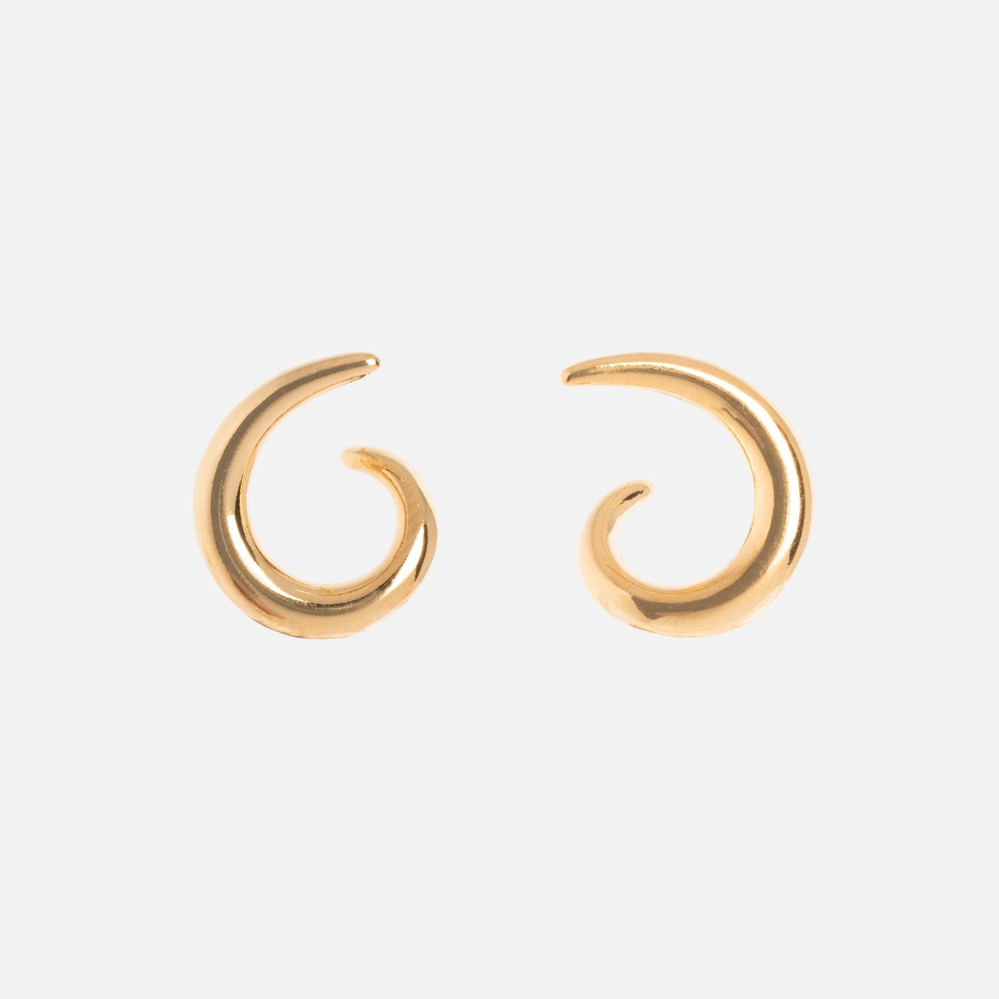 A pair of Modern Loop Hoop Earrings in small gold crescent shapes with a smooth, shiny finish, displayed against a plain white background.