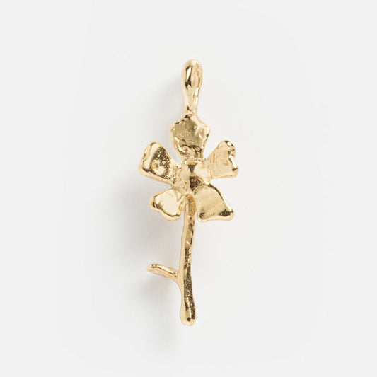 The Luiny x Local Eclectic Charms gold pendant is shaped like an abstract flower, crafted exclusively by Luiny with a top loop for attaching to a chain and shown against a white background.