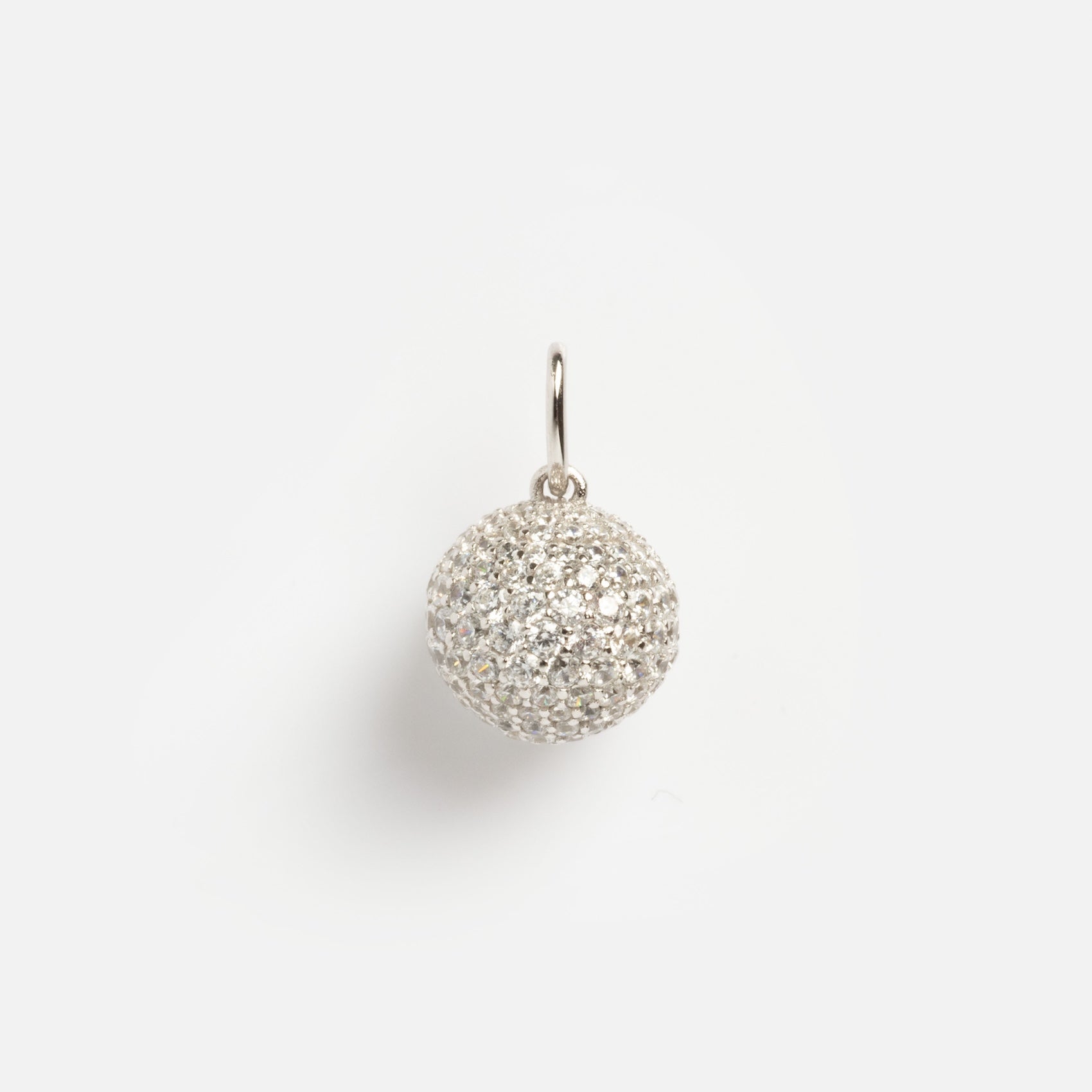 The Limited Edition PRIDE Month Charms feature a spherical silver pendant adorned with sparkling crystals and attached to a simple metal loop, shown on a plain white background.