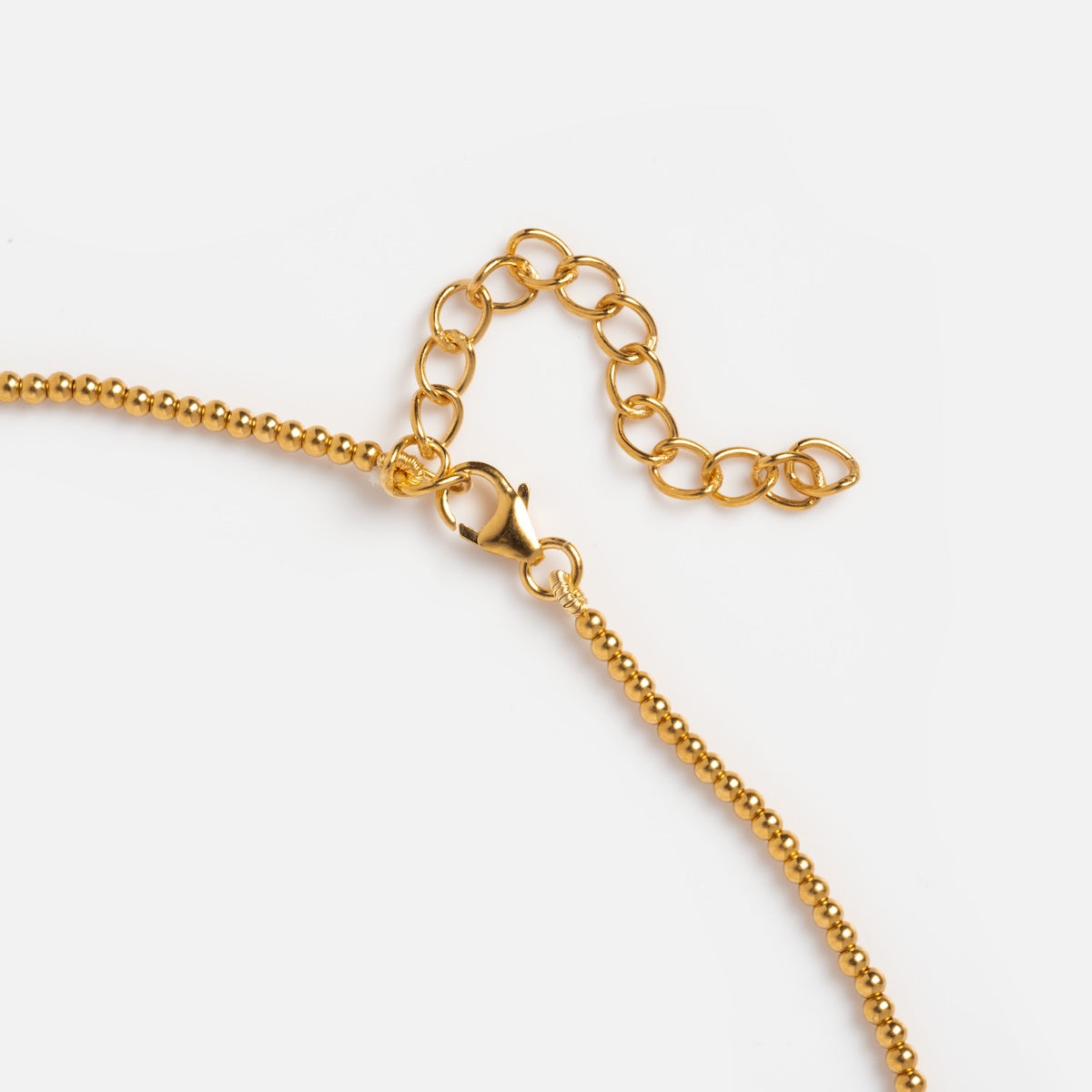 Close up of beaded vermeil clasp