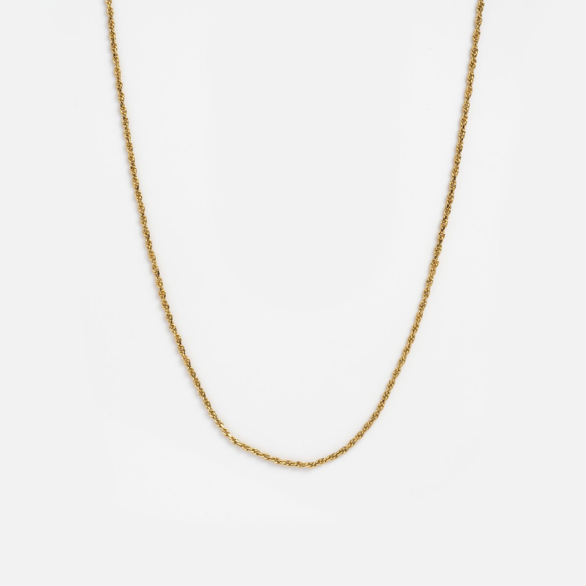 delicate rope chain on white background