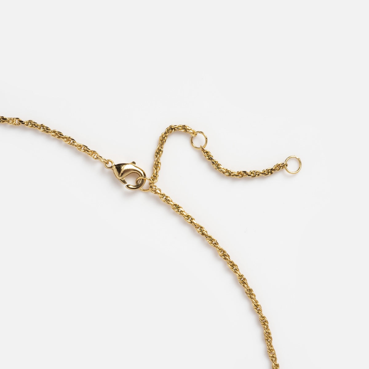 Close up of delicate rope chain clasp