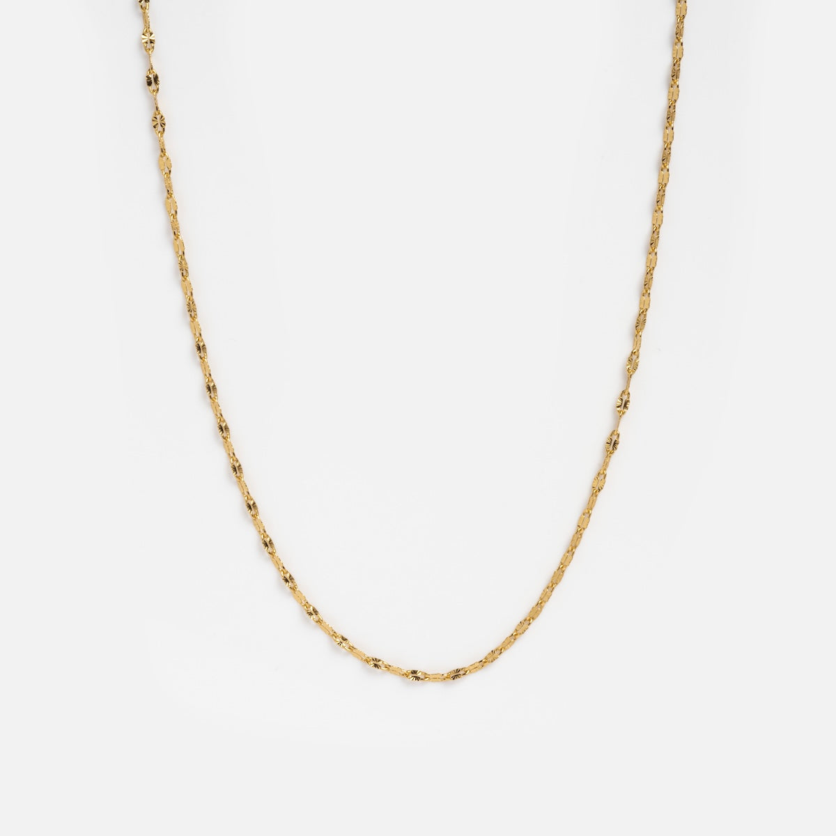 The Sparkle Link Chain is a delicate gold-plated necklace with small, evenly spaced oval links, shown on a plain white background—a Local Eclectic exclusive that elevates any look.
