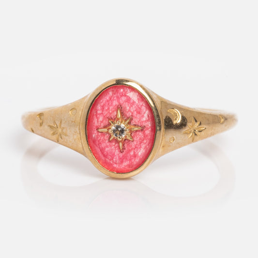 The Solid Gold Crystal Signet Ring for Manifestation features a red jade centerpiece in a sample size 7, crafted in 9k solid yellow gold and engraved with star and crescent moon symbols.