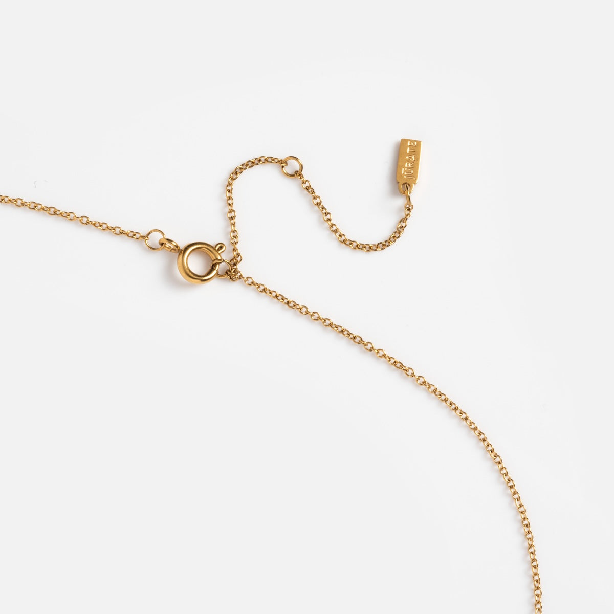 The My Cherie Necklace is a delicate gold-plated piece featuring a fine chain with a spring ring clasp and an adjustable extension with a small rectangular tag, displayed on a plain white background.