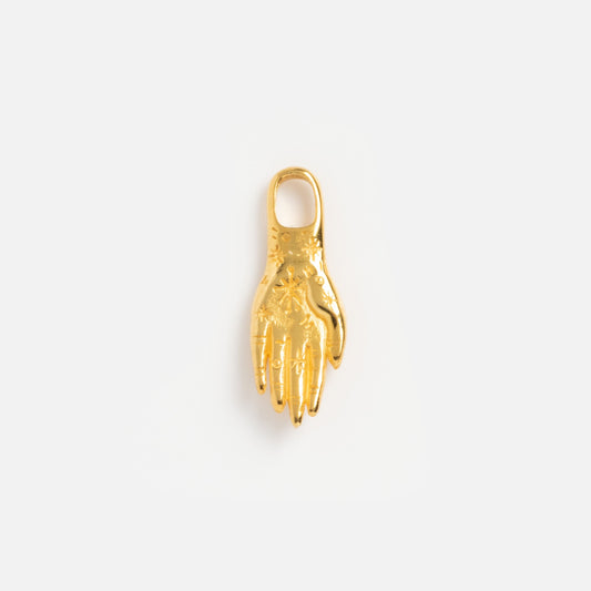 The Charms by Hunt of Hounds Exclusive Spellbound Sample is a small gold-tone metal right hand charm with engraved details and a top loop for attaching to jewelry, shown against a plain white background.
