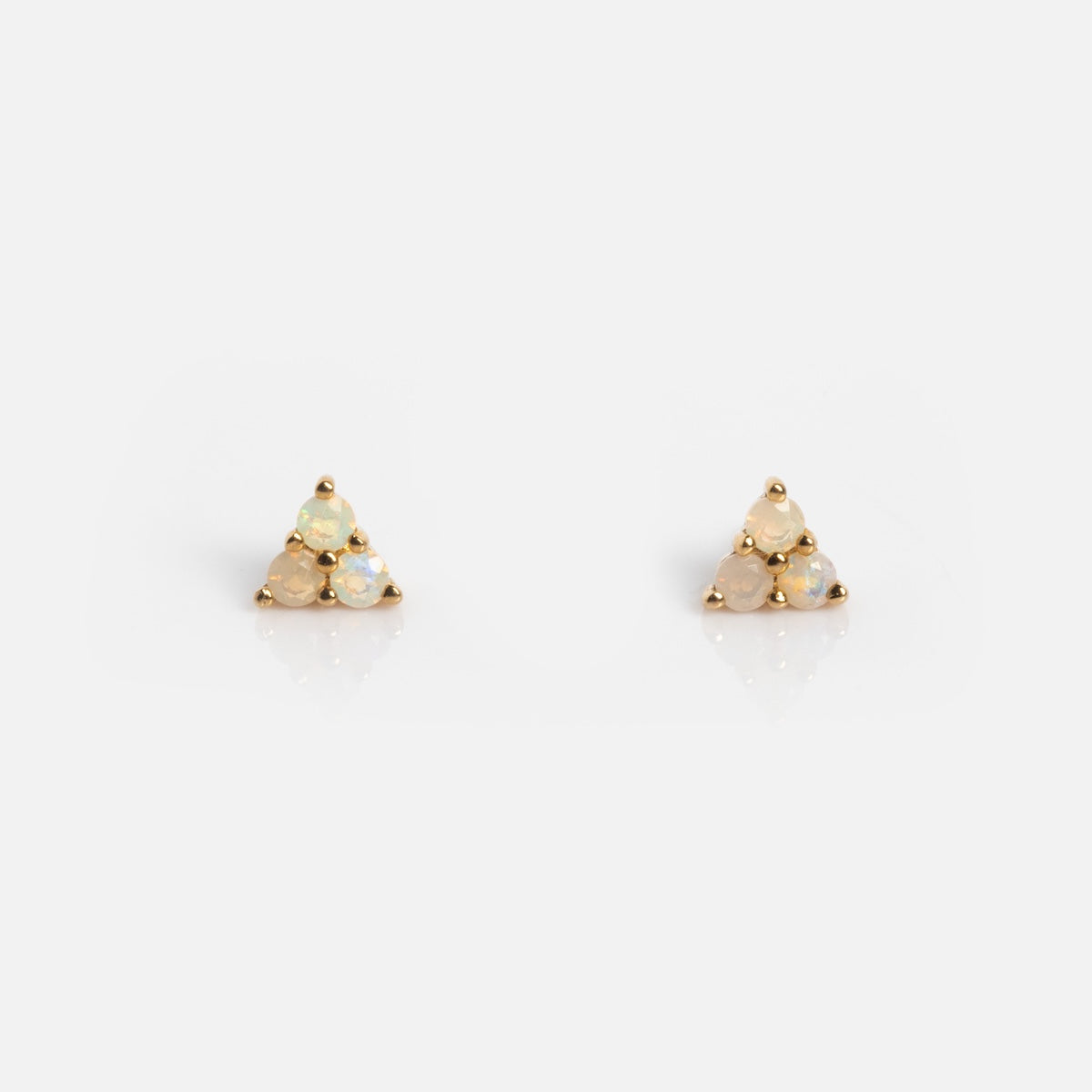 Solid Gold Opal Trio Flat Back Studs: small gold earrings with three tiny opals in a triangular arrangement, shown on a plain white background.