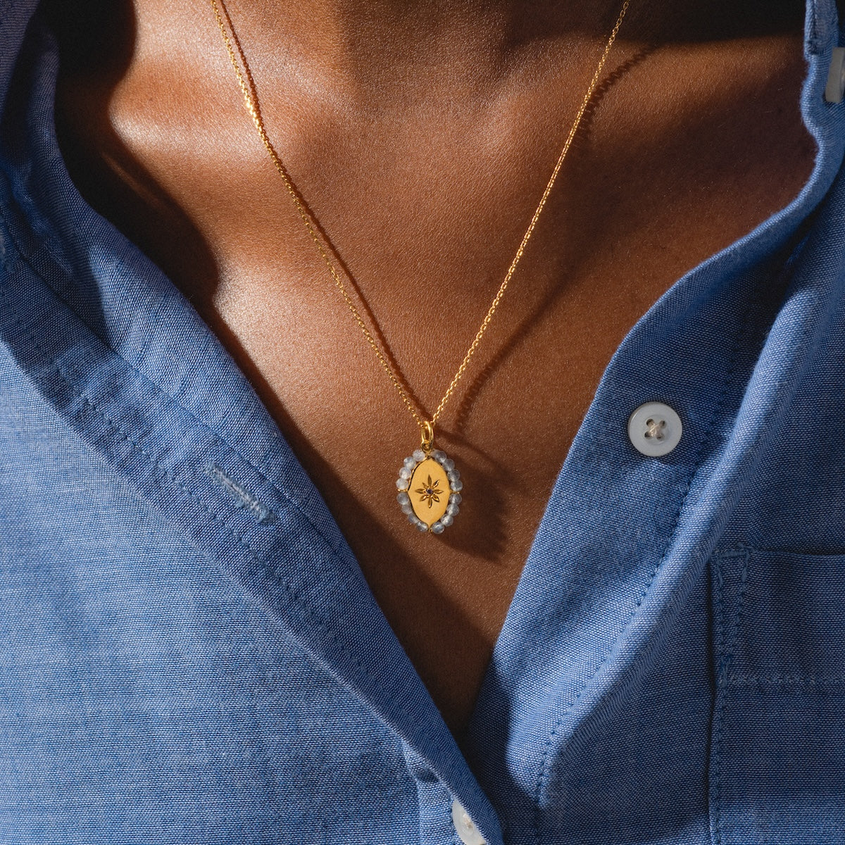 Close up of woman wearing Marceau Necklace