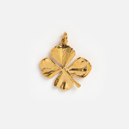 Gold four leaf clover charm