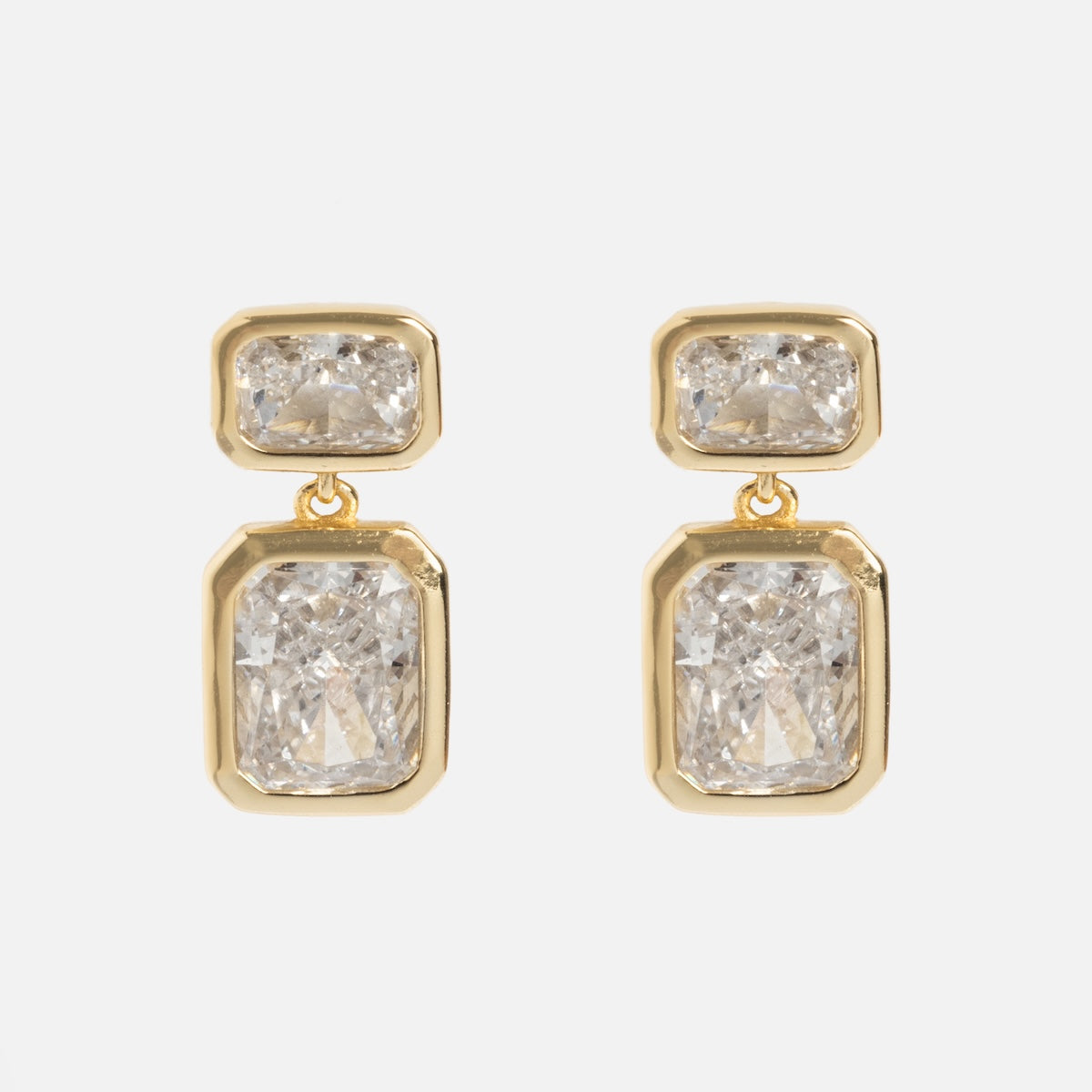 Emerald Baguette Drop Earrings shown on a plain white background, each featuring two clear rectangular gemstones set in 14k gold vermeil frames with the smaller stone above the larger one.