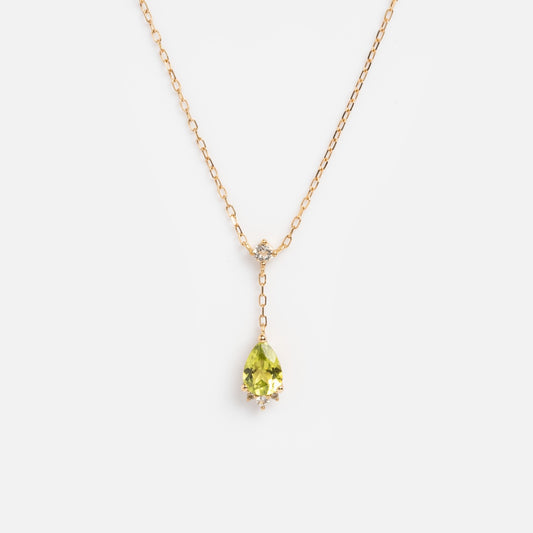 Peridot necklace on white background
