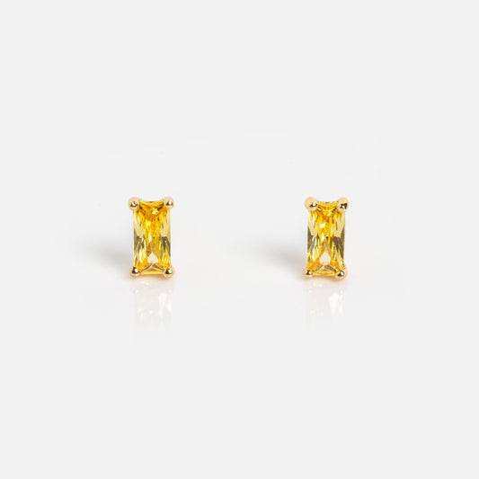 The Birthstone Baguette Studs November Sample features rectangular yellow gemstone studs set in gold prongs, shown on a plain white background.