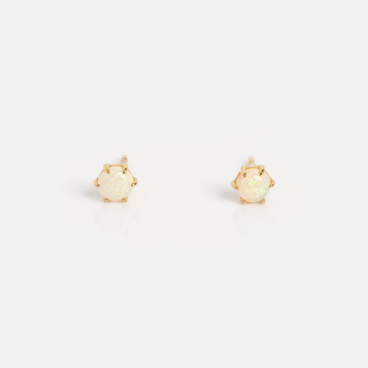 A pair of Solid Gold Dainty Hexagon Opal Stud Earrings Sample, featuring opals set in gold hexagonal prongs, displayed against a plain white background.