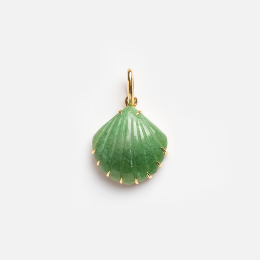 The Green Clam Shell Charm Sample features a green, shell-shaped pendant with gold edges and a gold loop for attaching to a chain, shown on a plain white background.