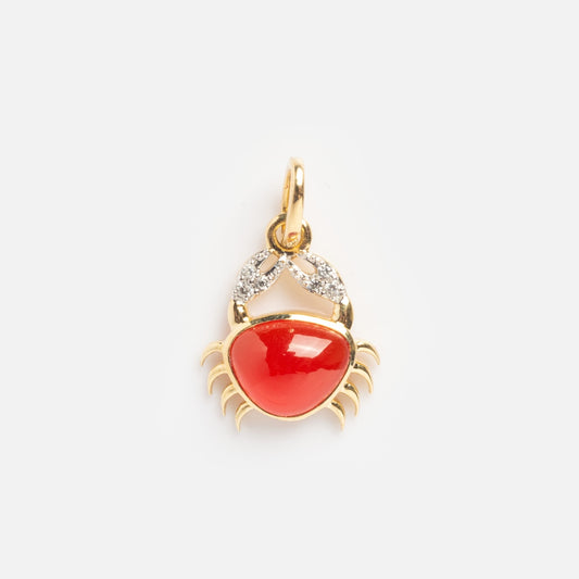 The Red Crab Charm Sample features a gold crab-shaped pendant with a shiny red gemstone body, diamond-like stones on the claws, and a gold loop for attaching to a chain, set against a plain white background.