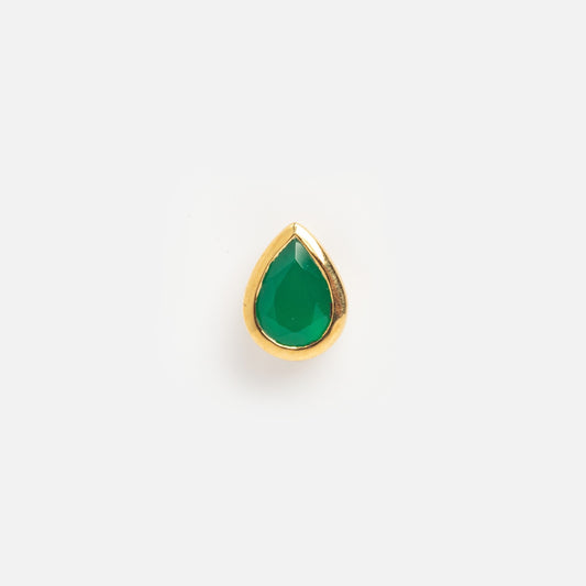 A pear-shaped lab emerald charm set in solid gold, shown against a plain white background.