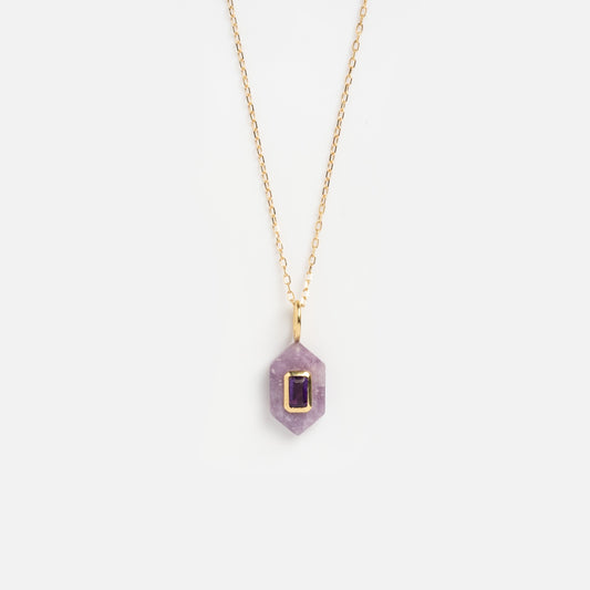 Solid Gold Large Aura Necklace Purple Sample featuring a geometric pendant with a rectangular gold frame and a dark purple stone at the center, shown on a plain white background.