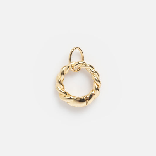 The Solid Gold Charm Clip features a twisted circular design with a small top loop for attaching to personalized necklaces or bracelets, shown on a plain white background.