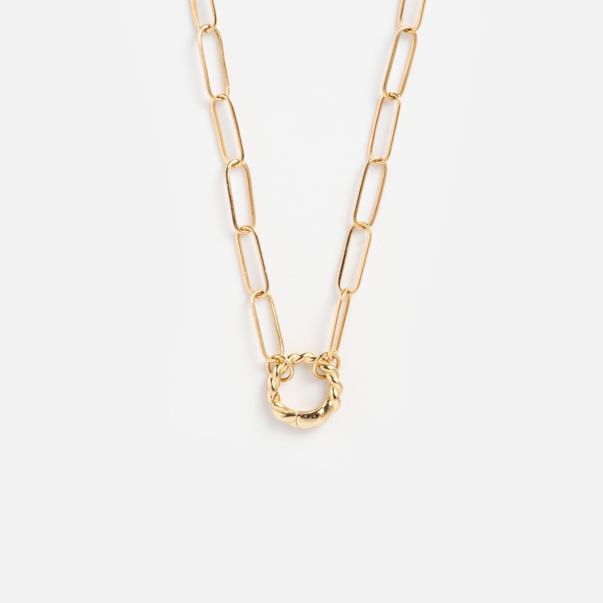 Solid Gold Perfect Start Charm Holder Necklace featuring elongated oval links and a central circular, twisted rope-style pendant, shown against a plain white background.