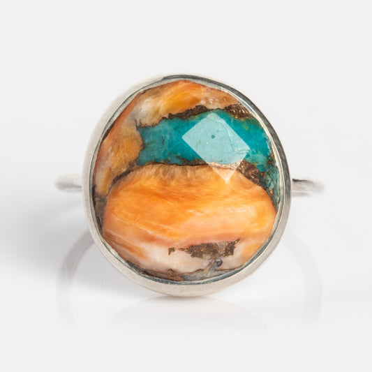 The Statement Oyster Turquoise Ring Sample Silver Size 8 features a large oval stone with vibrant orange and turquoise blue patterns set in a sleek bezel setting on a white background.