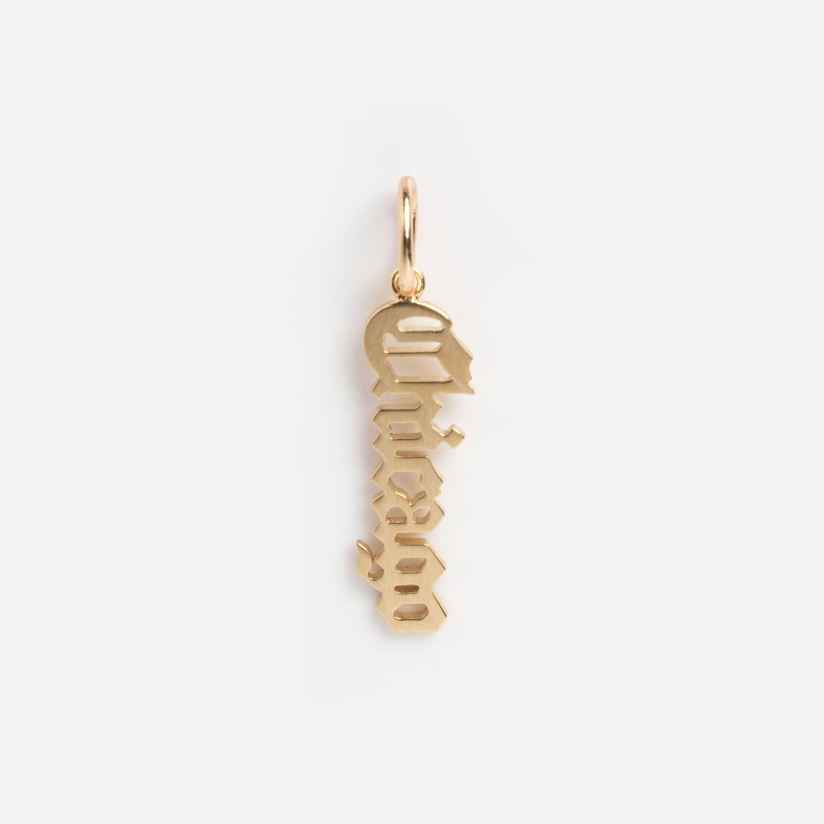 The Solid Gold Chicago Charm features an abstract human face with vertical geometric shapes, hanging from a small loop and displayed against a plain white background.