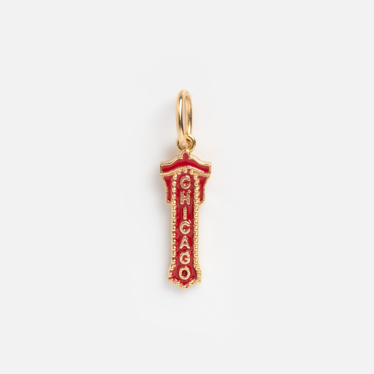 The Solid Gold Chicago Charm features the iconic Chicago Theater marquee sign, with "CHICAGO" spelled vertically in white on a red background.