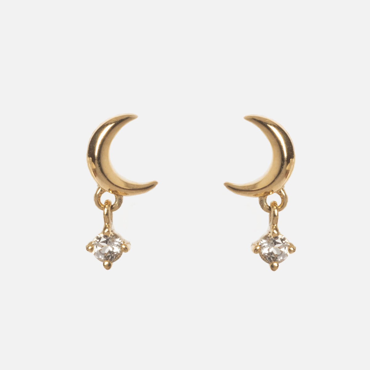 Solid Gold Crescent Moon Flat Back Studs featuring small, dangling clear gemstone charms beneath each moon, shown on a plain white background.