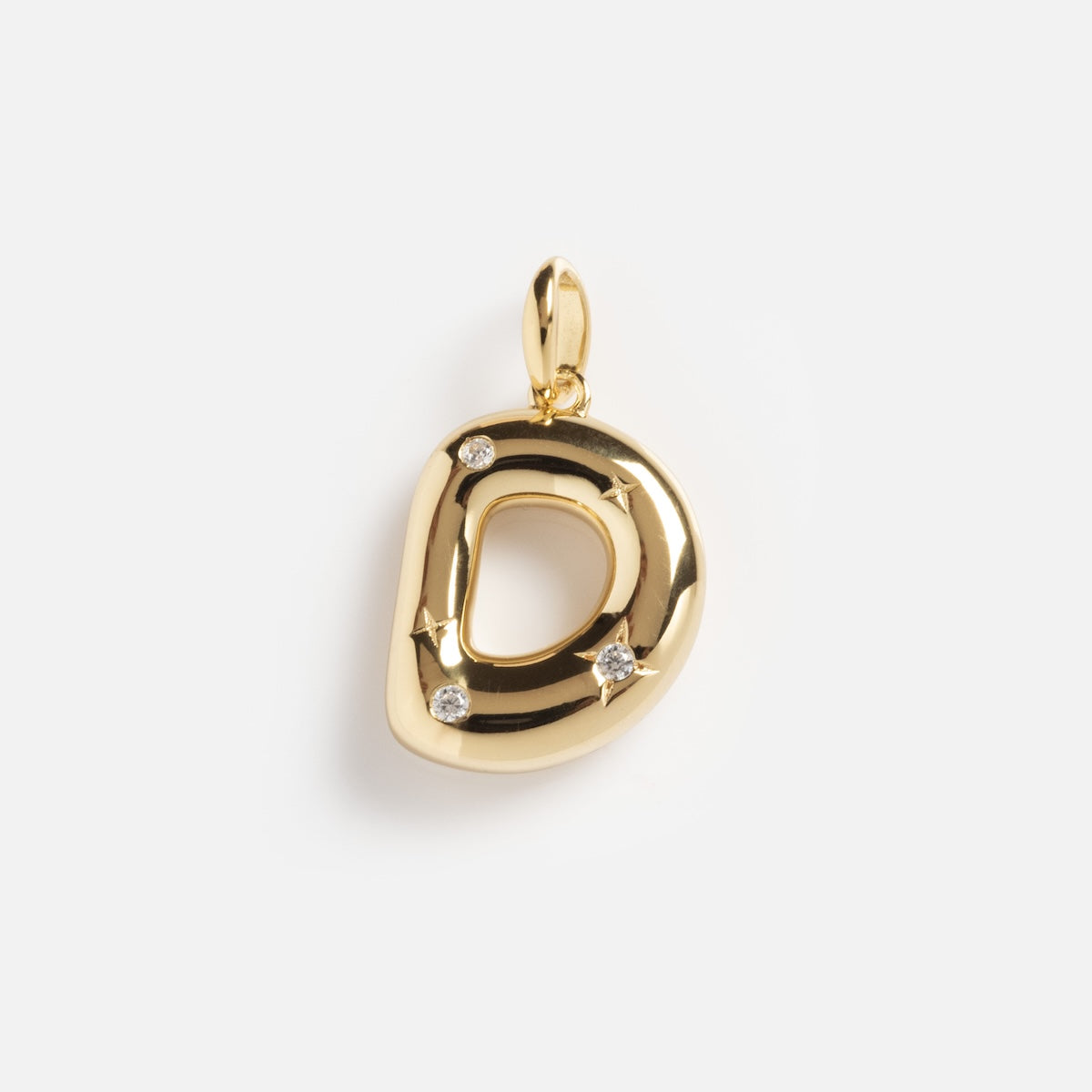 The Star Crossed Celestial Bubble Letter Charm is a gold pendant shaped like the letter D, featuring three small round diamonds, shown on a plain white background.
