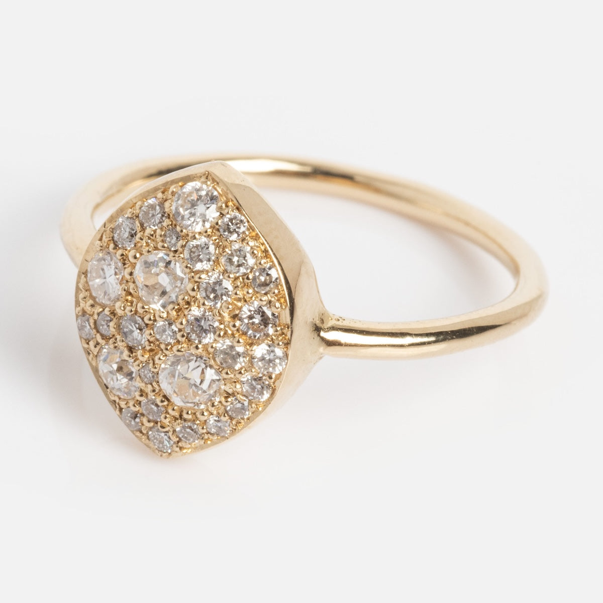 The "My Beloved" Soul Ring is a gold ring with a shield-shaped face adorned with numerous small round diamonds, displayed on a plain white background.