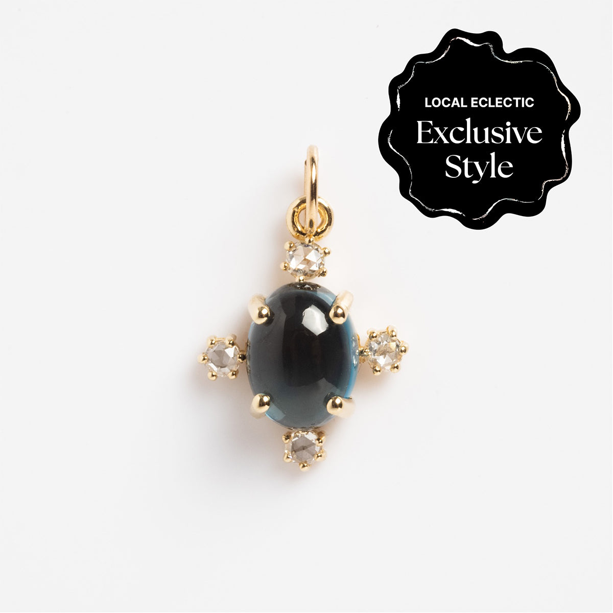 The One of a Kind 14k London Blue Topaz and Diamond Charm features a dark oval London blue topaz center, accented by four small diamonds in a cross pattern. A label notes this piece as an exclusive Local Eclectic style.