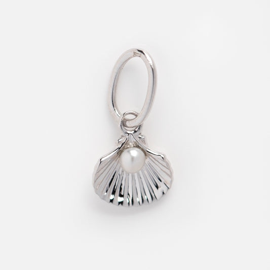 A Solid Gold Nature Charm in white gold, designed as a scallop shell with a central pearl detail and attached to an oval loop, shown against a plain white background.