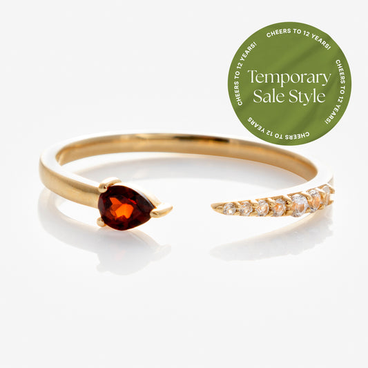 Solid Gold Garnet and Sapphire Open Front Band